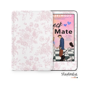 May include: A white Kindle e-reader with a pink floral pattern on the cover. The screen displays the cover of a book titled "Check Mate" by  S.J.  Zelwood, the bestselling author of "Theoretically".