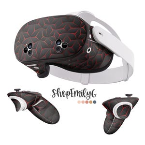 May include: A black and red geometric patterned VR headset with two white controllers. The headset has a white headband and a black faceplate. The controllers have a black and red geometric patterned design.