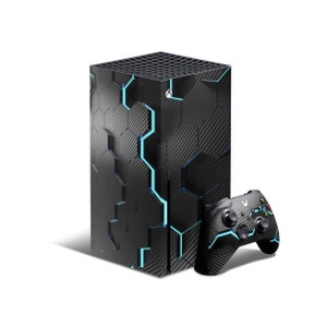 May include: A black Xbox Series X console with a blue and black geometric pattern skin. The console is next to a black Xbox controller with a matching skin.
