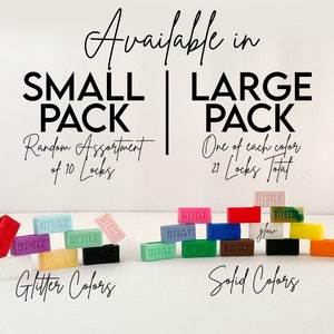 May include: Two rows of colourful plastic locks, labelled "Bitbelt". The top row is labelled "Small Pack" and "Random Assortment of 10 Locks". The bottom row is labelled "Large Pack" and "One of each colour 21 Locks Total". The top row has glitter colours and the bottom row has solid colours.