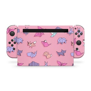 Skin per Nintendo Switch / Decalcomania origami / Skin rosa per Switch originale, dock, console e Joy-Con / OLED + Switch 2 + Standard