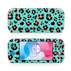 May include: A turquoise Nintendo Switch Lite console with a leopard print design. The console has a pink and black Joy-Con controller and a screen that says "NINTENDO SWITCH."