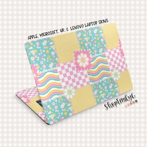 May include: Laptop skin with a patchwork design featuring daisies, wavy lines, and checkered patterns in pastel colors. The skin is for Apple, Microsoft, HP, and Lenovo laptops. The text "APPLE, MICROSOFT, HP, & LENOVO LAPTOP SKINS" is visible.