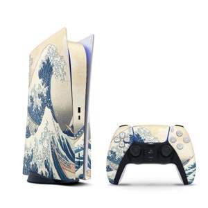 May include: A white and blue PlayStation 5 console with a custom skin featuring a Japanese woodblock print of a large wave. The console is next to a matching PlayStation 5 controller.