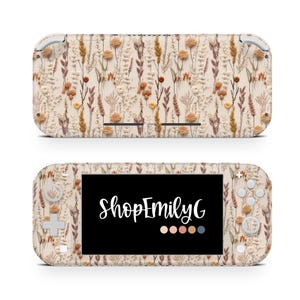 May include: A beige Nintendo Switch Lite console skin with a floral design of dried flowers in brown, beige, and orange. The screen shows the text "ShopEmilyG" in white script. The skin covers the entire console.