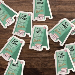 May include: Nine green and white stickers with a whimsical design of a sign that reads "Plot Twist: I bought more books." Each sticker features a stack of books with a cute face.