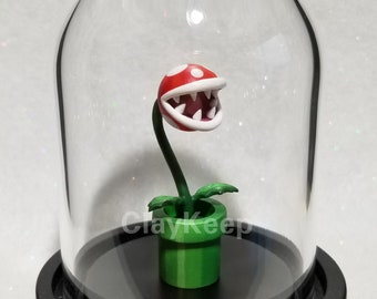 Diorama de arcilla polimérica de la Planta Piraña, figura en miniatura de Super Mario en cúpula de cristal