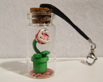 Planta Piraña en miniatura de Super Mario en una botella, figura de planta piraña de arcilla polimérica, arte en miniatura con arcilla
