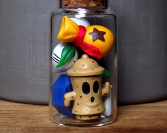 Figuras de videojuegos de Animal Crossing en miniatura dentro de una botella / Figuras de arcilla polimérica