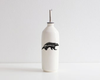 Handmade white glossy porcelain cruet with wolverine drawing by Cindy Labrecque, Canadian Wildlife collection