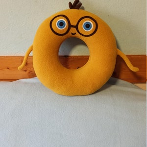 Juguete de peluche como Charlie y el alfabeto: letra ,,O,,