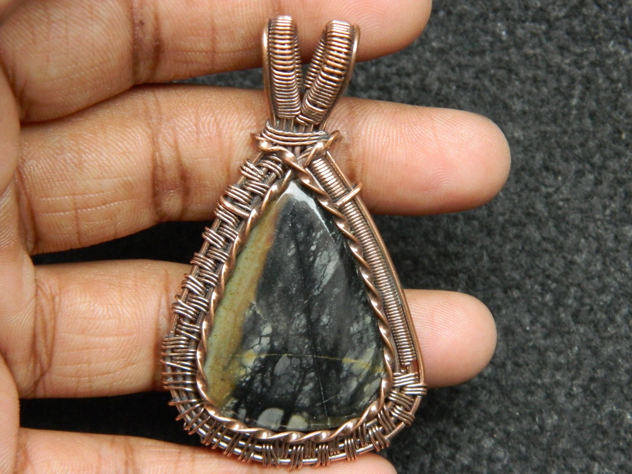 Artisan wire wrapped copper pendant with Picasso jasper stone