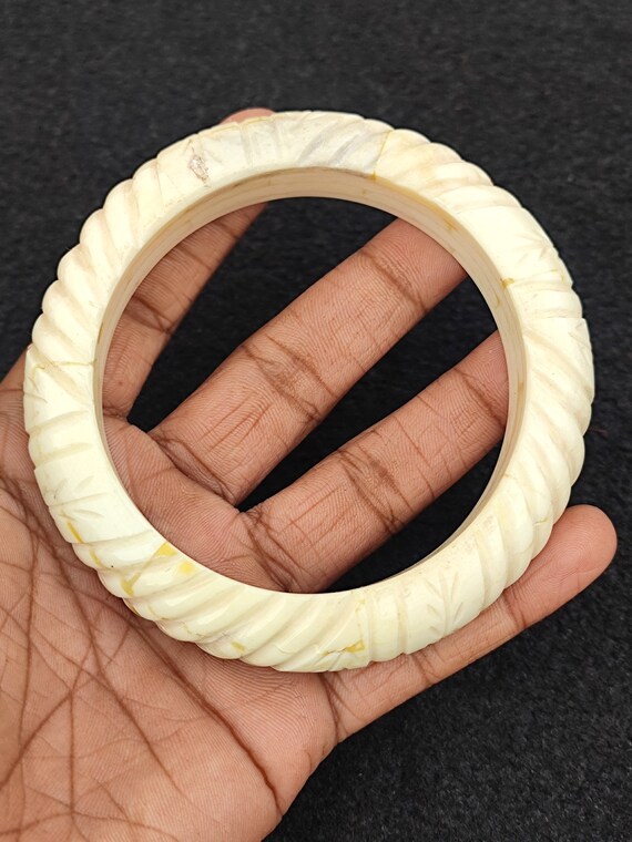 Carved store bone bracelet