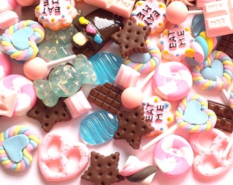May include: Assortment of colorful candy charms, including lollipops, chocolate bars, and waffle cookies. The charms are made of polymer clay and have a variety of designs, including hearts, stars, and swirls. The charms are perfect for adding a touch of sweetness to your crafts.