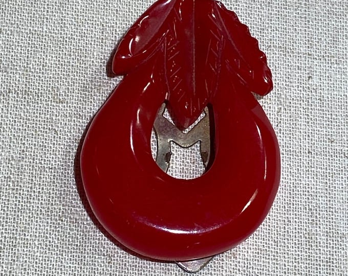 Carved Red Bakelite Dress Clip