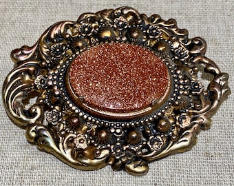 Vintage Brooch Oval Goldstone Glass in Two Tone Metal