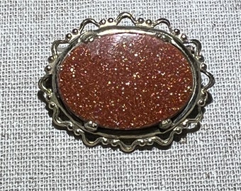 Vintage Prong Set Italian Goldstone Glass Brooch in Ornate Frame