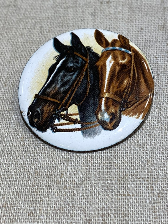 Round Enamel Brooch With Two Horse Heads