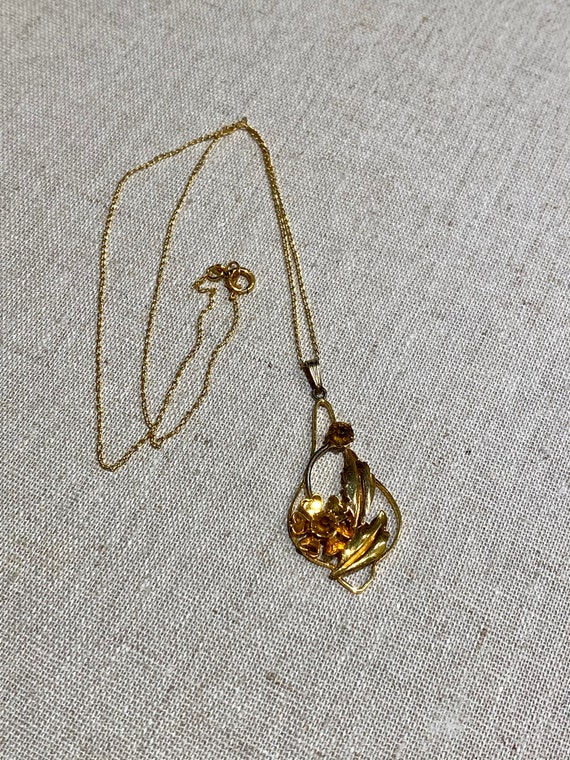 Delicate Gold Tone Pendant With Topaz Stones on Ch