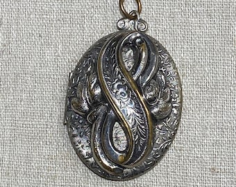 Vintage Worn Silver Tone Double Locket With Ornate Design