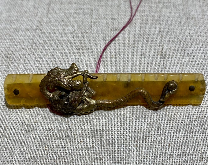 1900s Carved Celluloid Brooch  With Brass Dragon Design