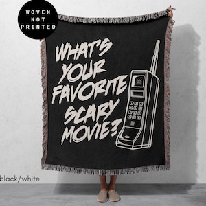 May include: Black and white woven throw blanket with the text "What's your favorite scary movie?" and a retro phone graphic.