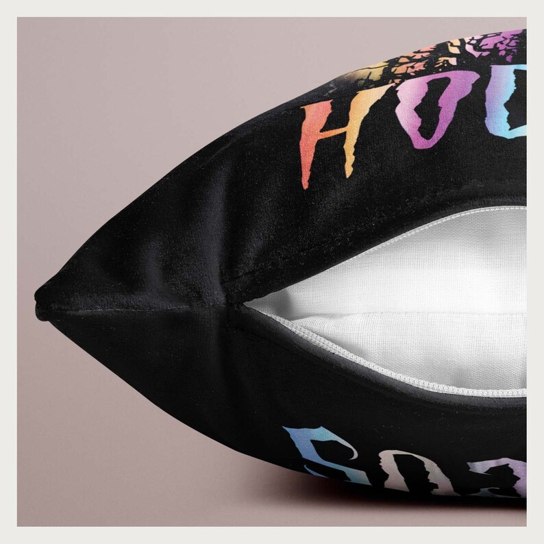 May include: Black pillow with a rainbow colored "House of 503" graphic printed on the front. The pillow has a zipper closure.