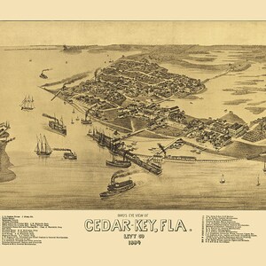 May include: Antique map of Cedar Key, Florida, from 1889, in sepia tones. The map shows a bird's-eye view of the town, with boats, buildings, and a long pier. The text "Bird's Eye View of Cedar Key, Fla. Levy Co. 1889" is visible.