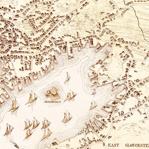May include: An antique map of East Gloucester, Massachusetts, showing the harbor and surrounding area. The map is drawn in black and white ink on a cream-colored background. The map includes the text "Five Pound Is." and "East Gloucester".