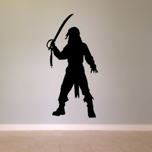 May include: Black silhouette of a pirate holding a sword, with a bandana on their head.