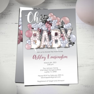 May include: A baby shower invitation with a grey background and a pink and grey balloon design. The text "Oh Baby" is in a large, white font with a light pink outline. The invitation includes the date, time, location, and RSVP information.