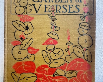 May include: A Child's Garden of Verses book cover. The cover is gold with red and black illustrations of flowers and leaves. The title is in black, and the author's name, Robert Louis Stevenson, is at the bottom.