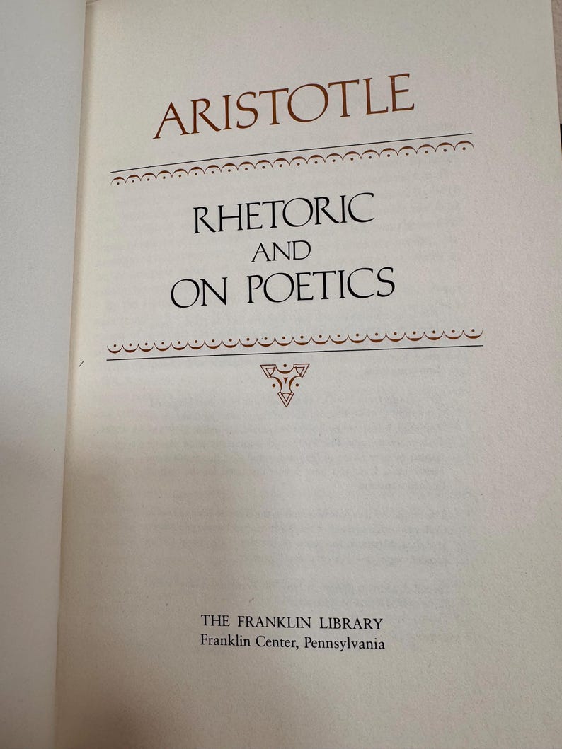 May include: An open book page displaying the title "ARISTOTLE" in brown, above "RHETORIC AND ON POETICS". The text is centrally aligned, with decorative lines and a symbol. The Franklin Library imprint is at the bottom of the page.