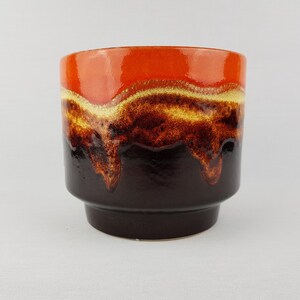 Maceta vintage DUMLER AND BREIDEN de cerámica marrón y naranja con efecto lava, modelo 715 16, fabricada en Alemania Occidental en los años 60 y 70.