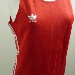 ADIDAS vintage sports sleeveless shirt made by adidas license in Ljubljana unisex shirt the brand with the 3 stripes rare adidas from eighti