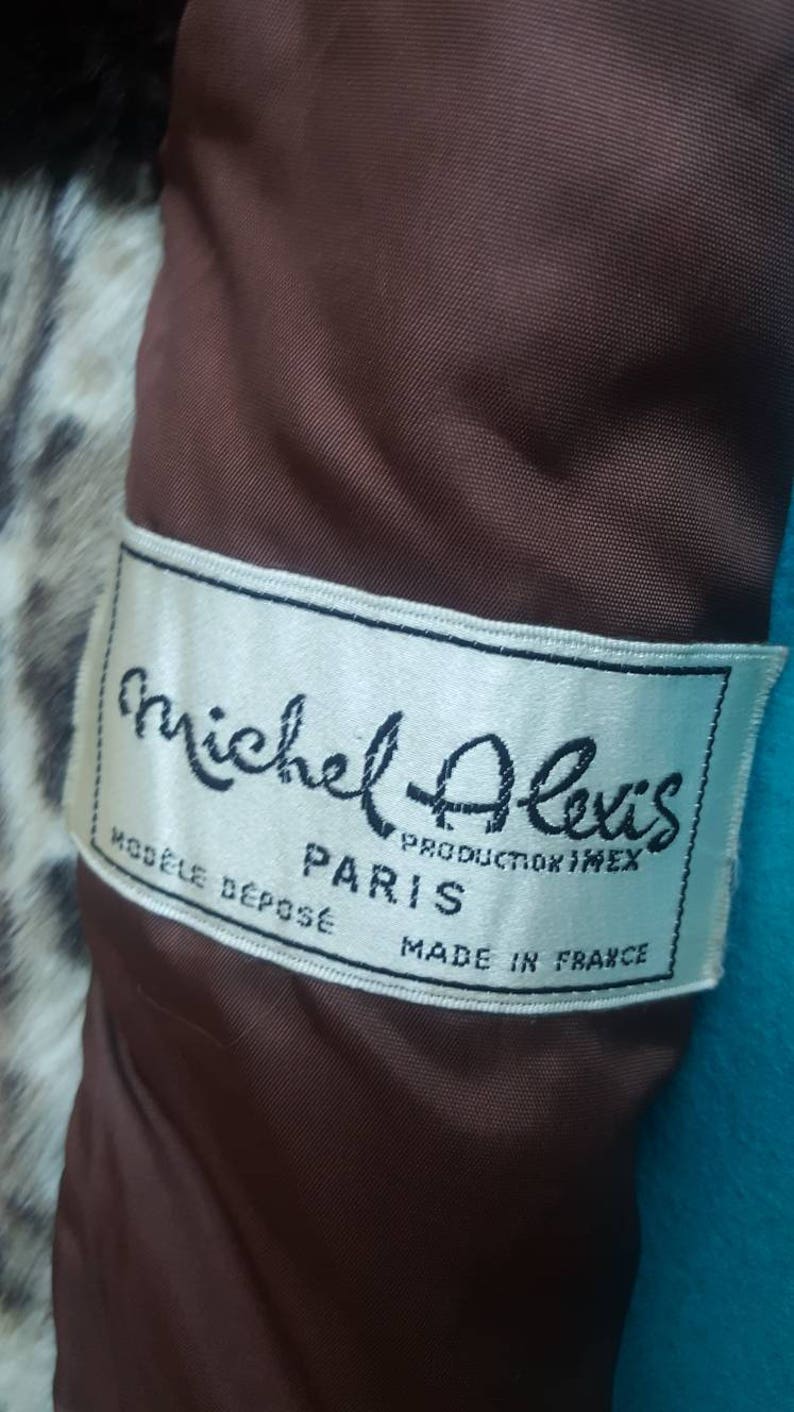 May include: White label with black text that reads "Michel Alexis, producteur imexe, Paris, Modele Depose, Made in France".