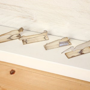 Set of 4 vintage silver plated knife rests.