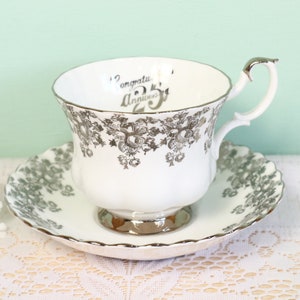Vintage Royal Albert tea cup and saucer, "Congratulations 25 Anniversary", silver-colored decorated