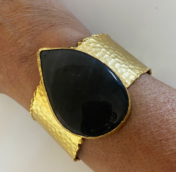 Hand Hammered Satin Gold Tone Cuff Bracelet with Large Black Semi Precious Stone