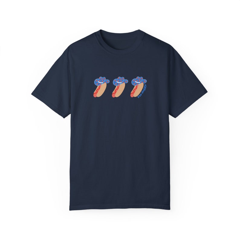 a navy t-shirt with a graphic 3 hot dogs with red, white, and blue cowboy hats