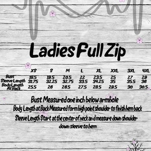 May include: A size chart for a full zip jacket with measurements in inches for bust, sleeve length, and body length at the back. The chart includes sizes XS, S, M, L, XL, XXL, 3XL, and 4XL. The text "Nurse Life" and "Ladies Full Zip" is visible at the top of the chart.