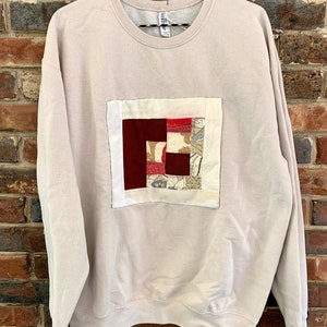 Reclaimed quilted sweatshirt with vintage fabric