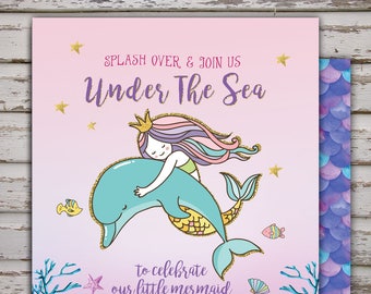 May include: A baby shower invitation with a mermaid and dolphin illustration. The invitation is pink and purple with gold glitter accents. The text reads "Splash over & join us Under The Sea to celebrate our little mermaid Ariella's Baby Shower!"  Saturday June 17th, 2:30pm to 5:00pm. Under The Sea 22657 Bistrol Wood Dr Barrington, IL 60048. Registered at Babies "R" Us & Target. RSVP by June 1st to Lisa at 310.555.8767 or emailhere@gmail.com. www.lyonsprints.com