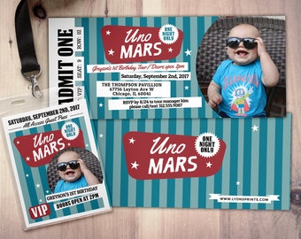 Peut inclure: Un billet bleu et rouge avec des étoiles blanches et le texte "Uno Mars" et "One Night Only". Le billet est pour une fête d'anniversaire avec le texte "Greyson's 1st Birthday Tour" et "Doors open 2pm".