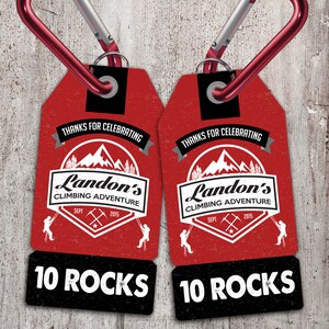 Könnte beinhalten: Zwei rote und schwarze Geschenkanhänger mit einer Bergszene und dem Text "Danke fürs Feiern von Landons Kletterabenteuer Sept 2015" und "10 Felsen".