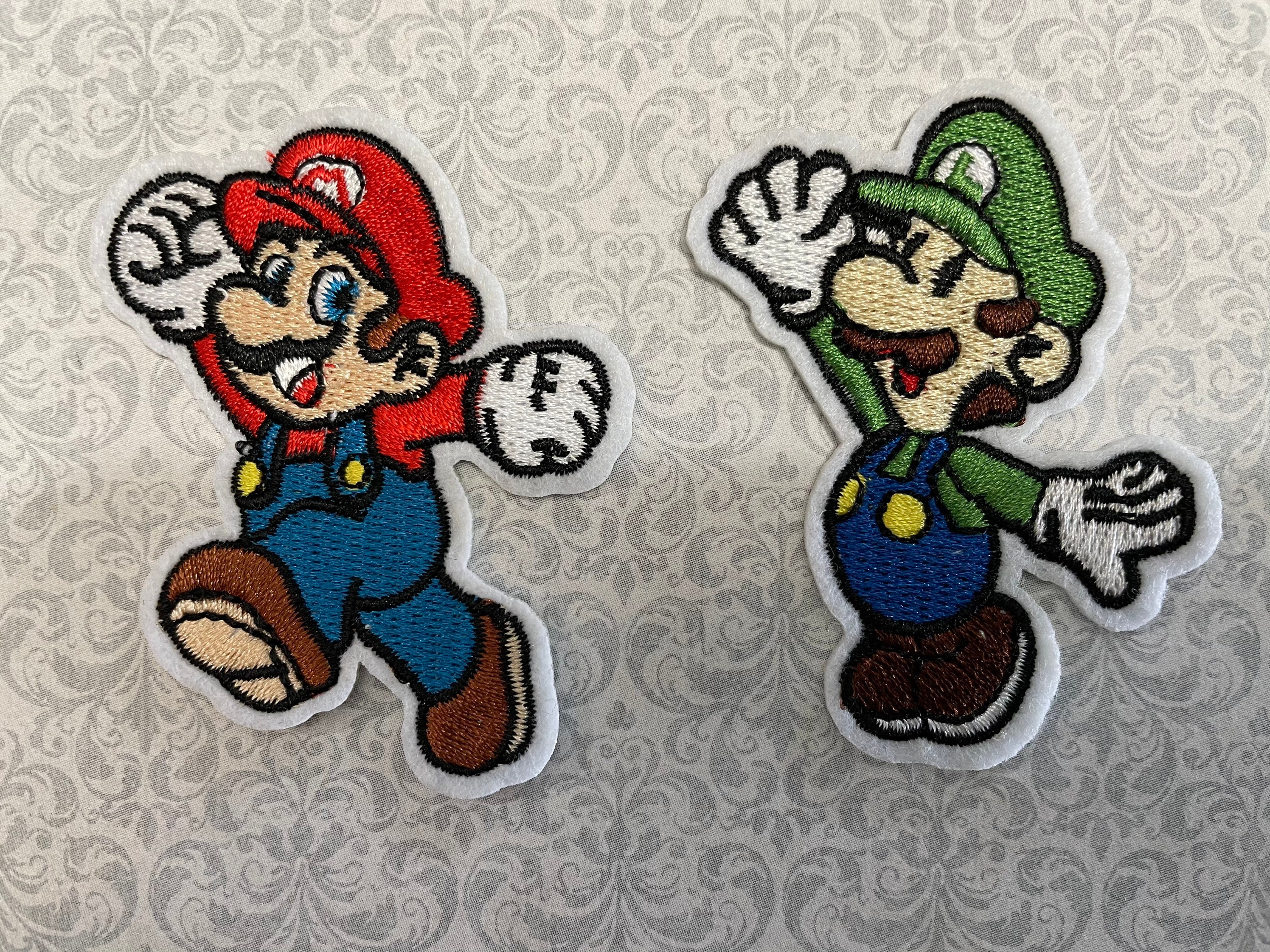 8 Bit Mario or Luigi Racoon Tail Shiny Metallic Embroidery Iron On patch.  Super Mario Bros. Pixelart.