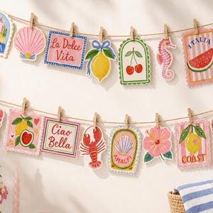 Mediterranean summer party garland mockup made with watercolor coastal clipart, including Riviera, La Dolce Vita, lemon, cherries, seahorse, Italia watermelon, crab, lobster, Amalfi shell, hibiscus flower, Coast lemon, and sardine tin designs. Cute printable banner idea for parties, celebrations, and coastal decor.