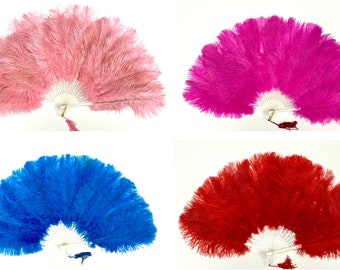 May include: Four ostrich feather fans in different colors: pink, fuchsia, blue, and red. Each fan has a white wooden handle and a tassel.