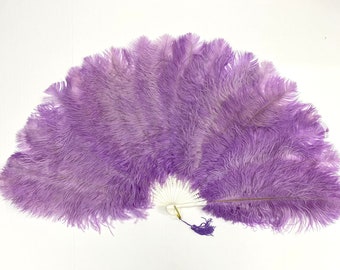 May include: A purple ostrich feather fan with a white handle and a purple tassel.
