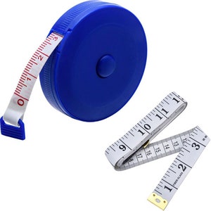 May include: A blue retractable tape measure with a white tape marked in inches. The tape measure is extended and shows numbers from 0 to 11.